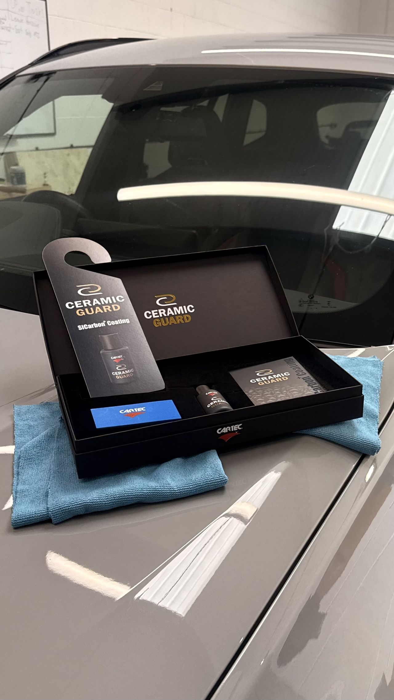 Ceramic Guard coating kit on the bonnet of a BMW X3 M